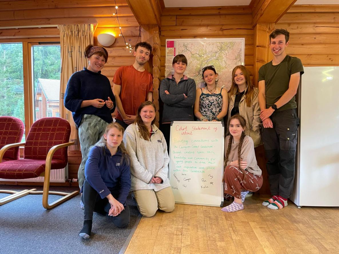 The Cairngorms Connect Cohort pose with their statement of intent on the final morning of the residential